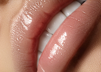 Closeup plump Lips. Lip Care, Augmentation, Fillers. Macro photo with Face detail. Natural shape with perfect contour