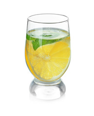 Basil water with lemon in glass, isolated on white