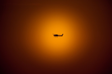 Airplane and sunset