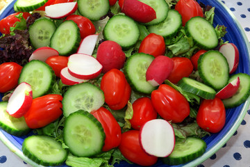 A plate full of healthy salad produce