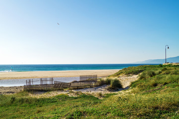 Beach and sandbreak in Tarifa, Spain