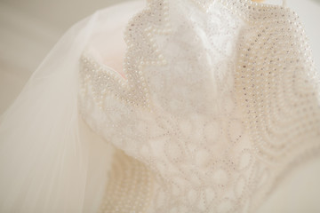 white Wedding dress detail close-up photo