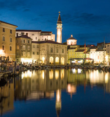 Piran habour and church at blue hour after sunset Slovenia