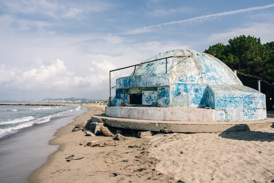 Old military bunker in Albania from Enver Hoxha's dictatorship, on the Adriatic Sea in the resort area of Golem