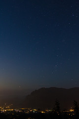Nightscape of North Bend beneath Mt. Si and stars, from Rattlesnake Ledge