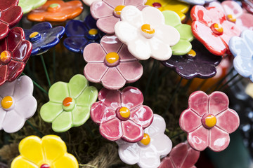 Traditional Hungarian ceramic flowers to decorate the interior of gardens and flower pots 