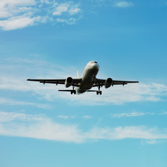 Fototapeta na wymiar landing of an airplane in international airport