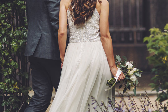 bridal couple, sensual bride and happy groom together