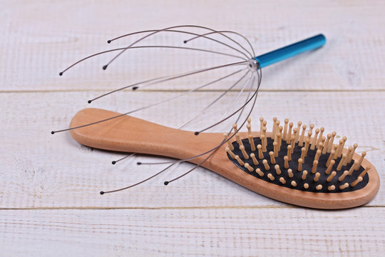 Head Massage Tool, Wooden Scalp And Hair Massage Brush On White Wooden Background