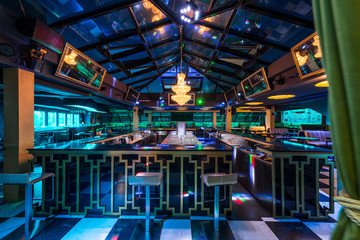 Fototapeta premium Skylight above bar counter in caffe bar interior