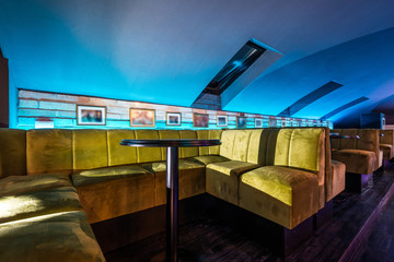 Lounge bar interior with big sofas