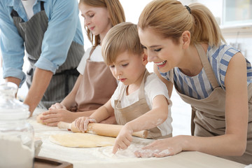 Family cooking in kitchen. Cooking classes concept