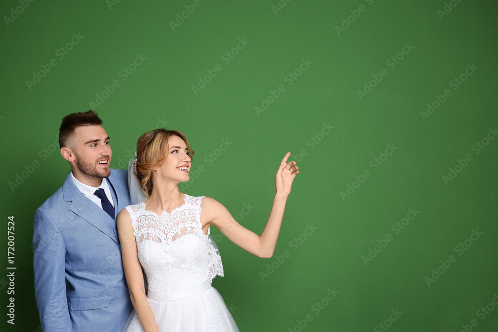 Sticker Happy wedding couple on color background