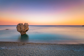 Lonely rock sculpture at the shape of heart, Preveli, Crete, Greece