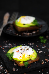 Toasts with avocado and poached eggs