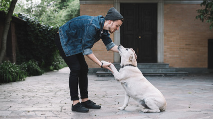 A guy with a dog