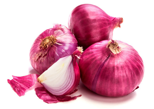 The Fresh red onion sliced bulb and onion peel isolated on white background