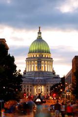 The Wisconsin state capital after sunset.  The building houses both chambers of the Wisconsin legislature along with Wisconsin Supreme Court .
