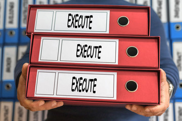 Execute concept words. Folder concept. Ring binders.