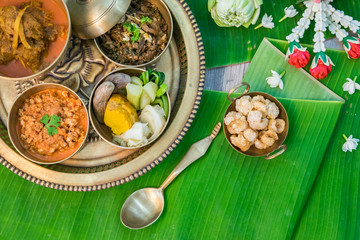 Northern Thai food with banana leaf background