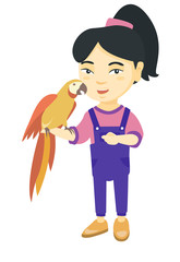 Asian smiling girl playing with her pet parrot. Full length of little girl holding parrot on her hand. Vector sketch cartoon illustration isolated on white background.