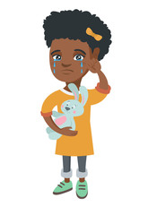 African-american girl crying and wiping the tears away. Little girl crying and holding toy rabbit in hand. Vector sketch cartoon illustration isolated on white background.