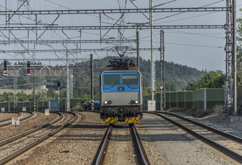 Obraz premium Trains in Olbramovice station with platforms