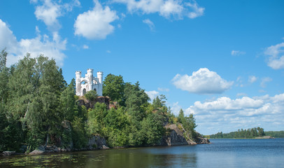 Fototapeta na wymiar Panorama of the island with a white tower on top