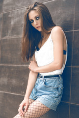 Fototapeta premium Beautiful brunette on the street