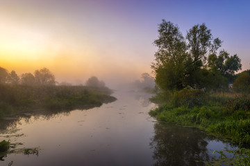 eautiful, misty morning on the river in the summer