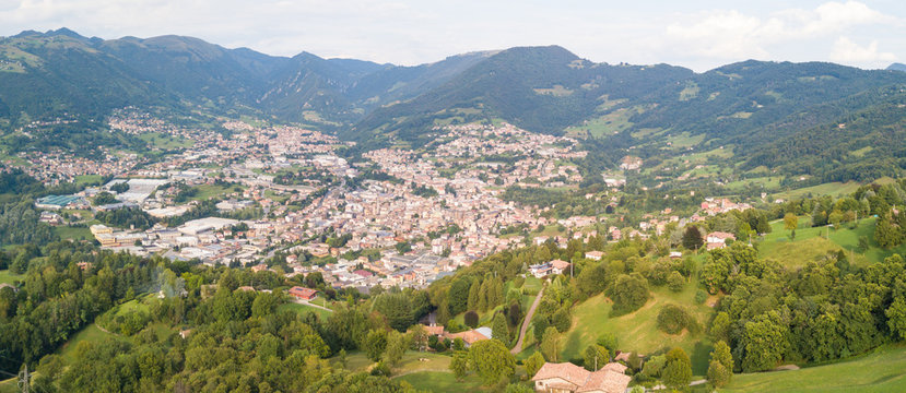 Drone aerial view to the villages of Leffe, Gandino, Casnigo, Peia and Cazzano Sant Andrea, located at Gandino Valley, Bergamo, Italy