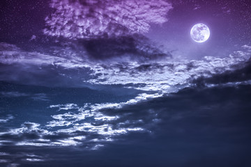Fototapeta na wymiar Night sky with bright full moon and dark cloud, serenity nature background.