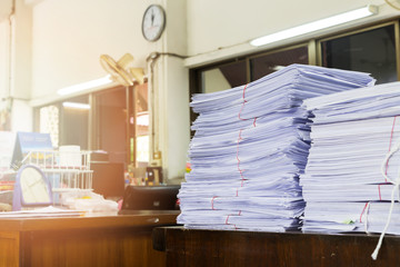 Close up of business documents stack on desk , report papers stack