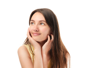 Fototapeta premium Pretty teenage girl posing on white background