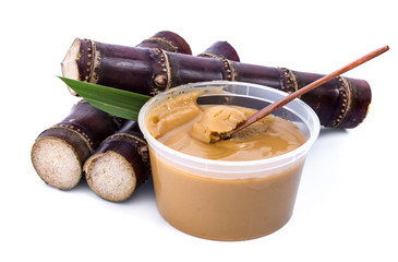 cane brown sugar on white background