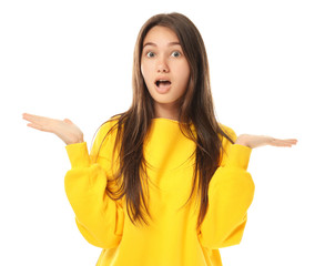 Pretty teenage girl posing on white background