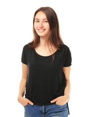 Fototapeta premium Pretty teenage girl posing on white background