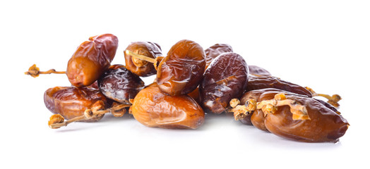 dried fruits from date palm isolated on white background