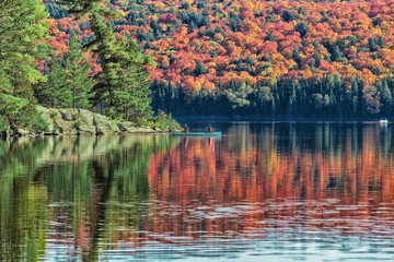 Boating Lake with fall trees reflection