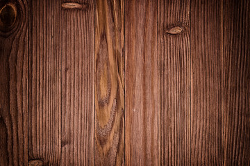 Old wood texture background with dappled sunlight