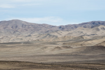 Naklejka na ściany i meble Landscape of mountains in the desert