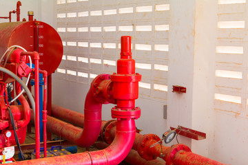 pipe system Old big plumbing  red which has dust dirty inside of building industrial