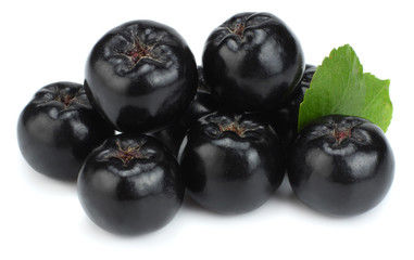 Chokeberry with leaf isolated on white background. Black aronia