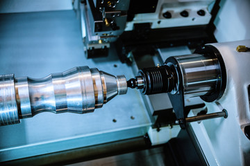 Machining of parts on a lathe.