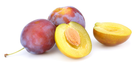 fresh plum fruit with cut plum slices isolated on white background