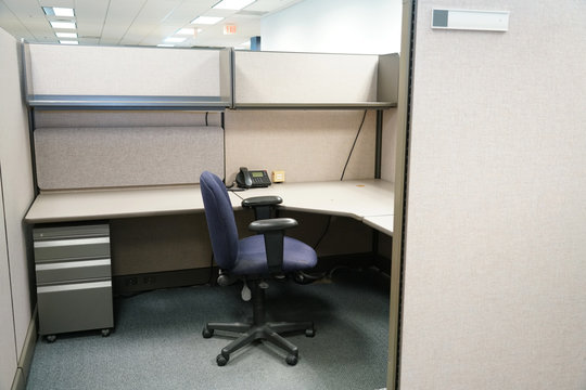 cubicle and office furniture in office room
