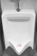 Close up on urinal in the restroom