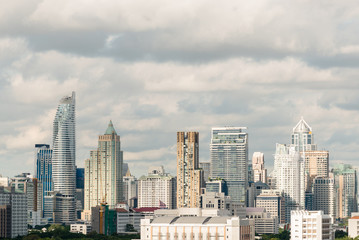 View of Bangkok modern office buildings, condominium in Bangkok city downtown in cloudy day, Bangkok , Thailand