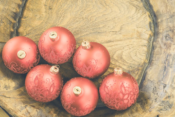 Red Christmas decoration glass baubles background.