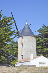 Traditional windmill at coast of vendee, France